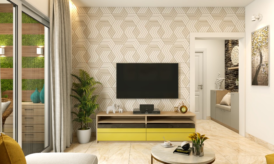 A modern 1BHK apartment with a warm yellow colour scheme.