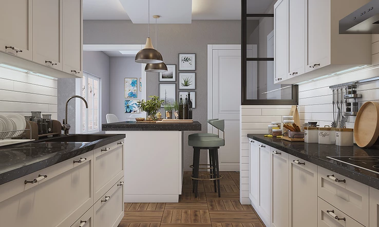 A monochrome affair with white cabinetry and an extended kitchen island