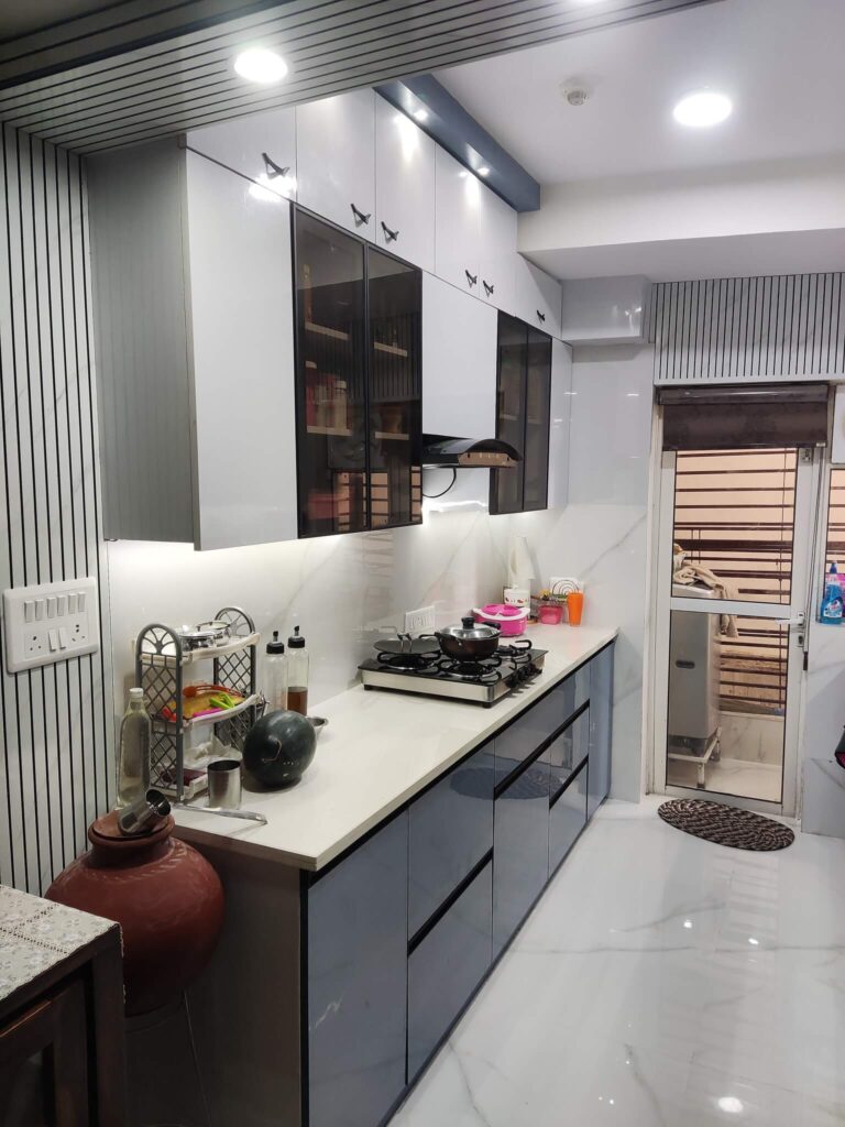 Modular-kitchen-designer-in-paras-teria-in-blue-and-white-colour-combination