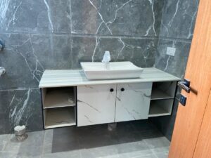 Floating Vanity with Marble-Finish Basin Counter and Open Shelving
