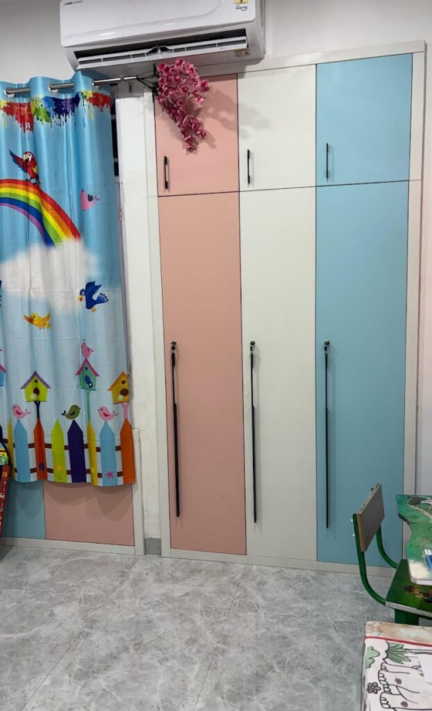 Pastel 3-Door Wardrobe for Kids' Room in Pink, White & Blue Finish