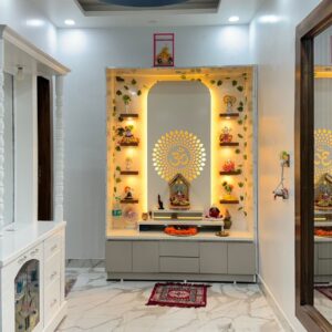Wooden mandir design for home with LED backlighting, "Om" symbol, decorative shelves, and spiritual idols.
