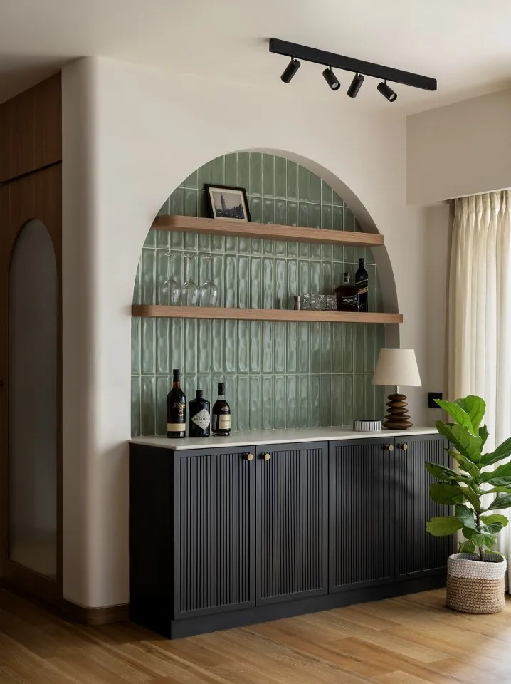 Elegant Bar Area with Green Tiles & Black Cabinets for a Contemporary Look

