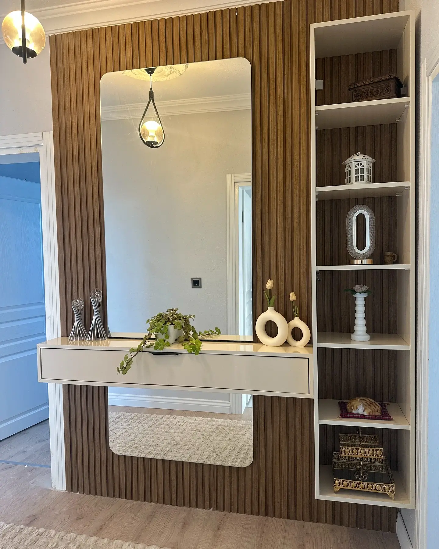 Elegant Wall-Mounted Console with Vertical Wooden Paneling – A Stylish Touch for Modern Hallways