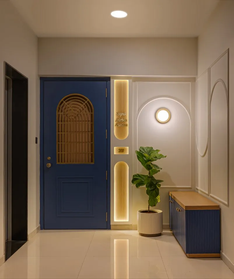 Modern Blue Entrance with Golden Accents for a Stylish Look in Noida Homes
