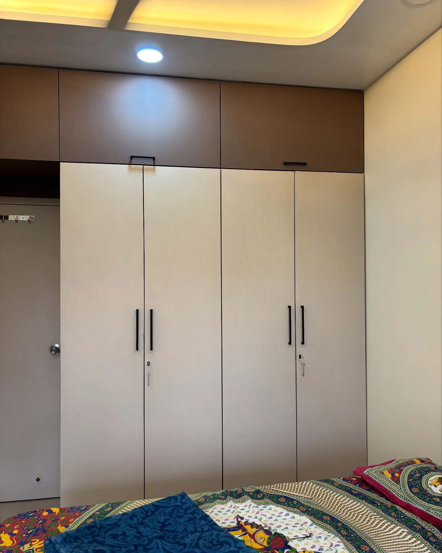 Contemporary Sliding Wardrobe with Textured Panels & LED Lighting