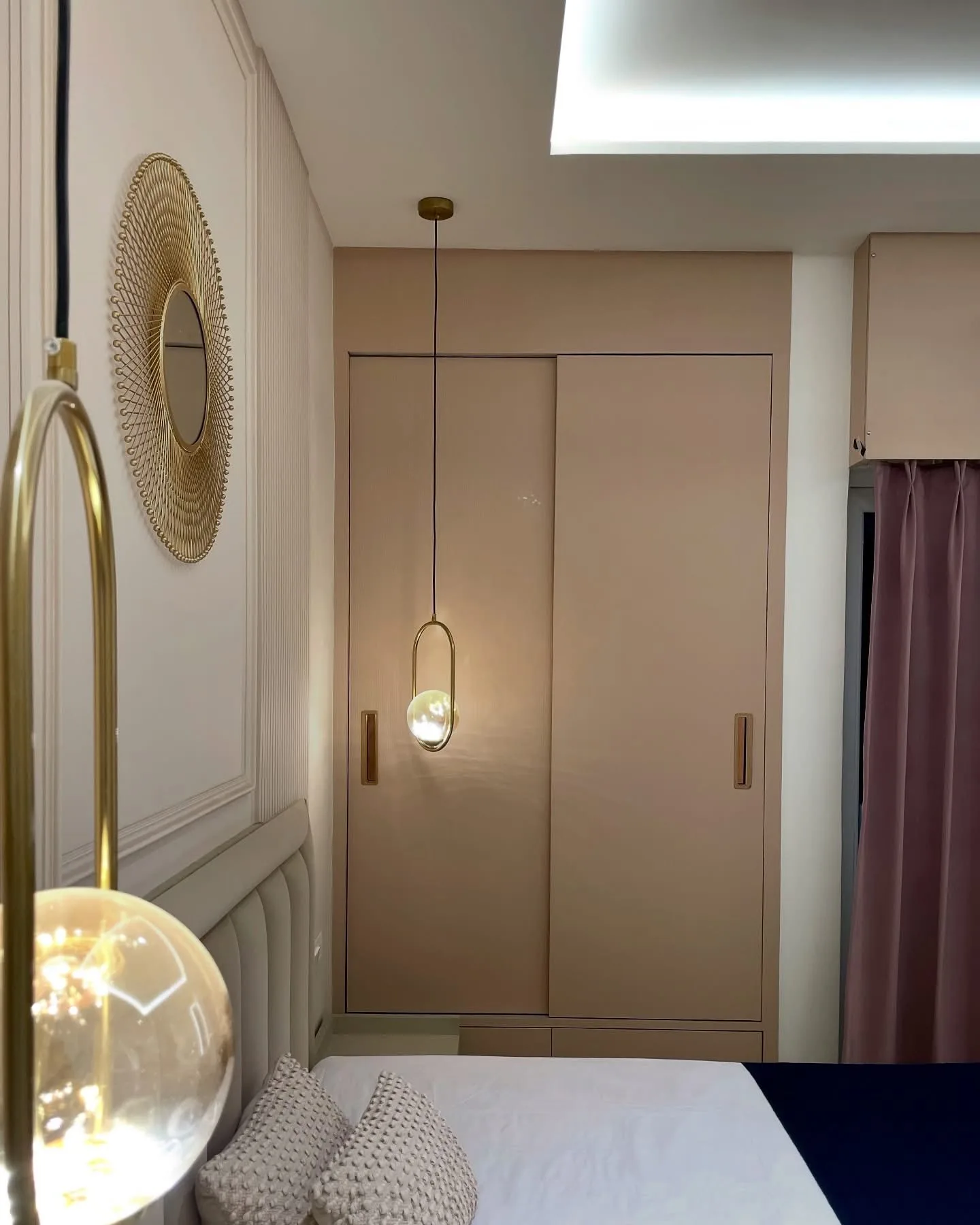 Elegant Sliding Wardrobe with Soft Beige Finish and Gold Accents