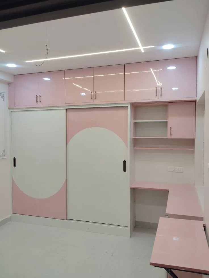 Modern Pink Wardrobe and Study Unit Design for Noida Apartments