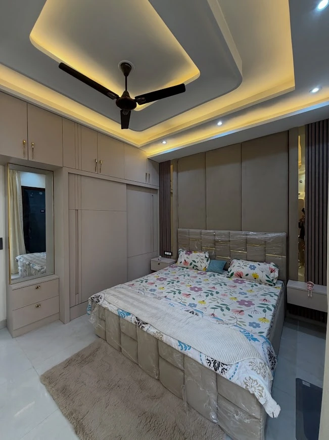 A Complete Bedroom Design with Full-Height Wardrobe and Upholstered Headboard