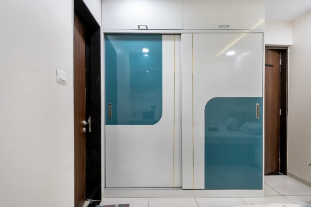 A Modern Sliding Wardrobe Design with Dual-Tone Panels and Soft Curves