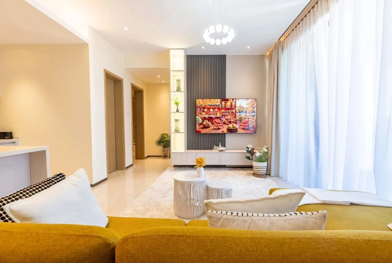 Modern Living Room TV Unit Design for Noida Homes | Fluted Panel Wall