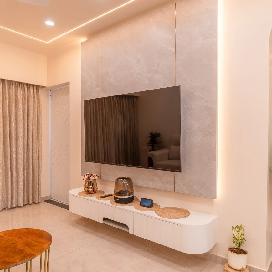 A Subtle Luxury TV Unit with Textured Panel and Soft Backlighting