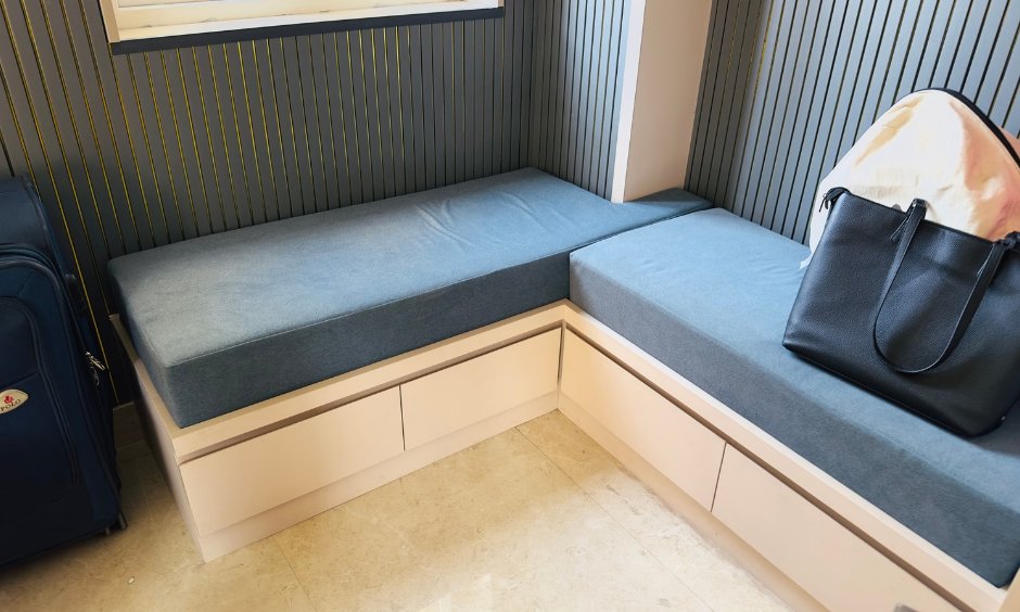 L-shaped bay-window seating with storage drawers